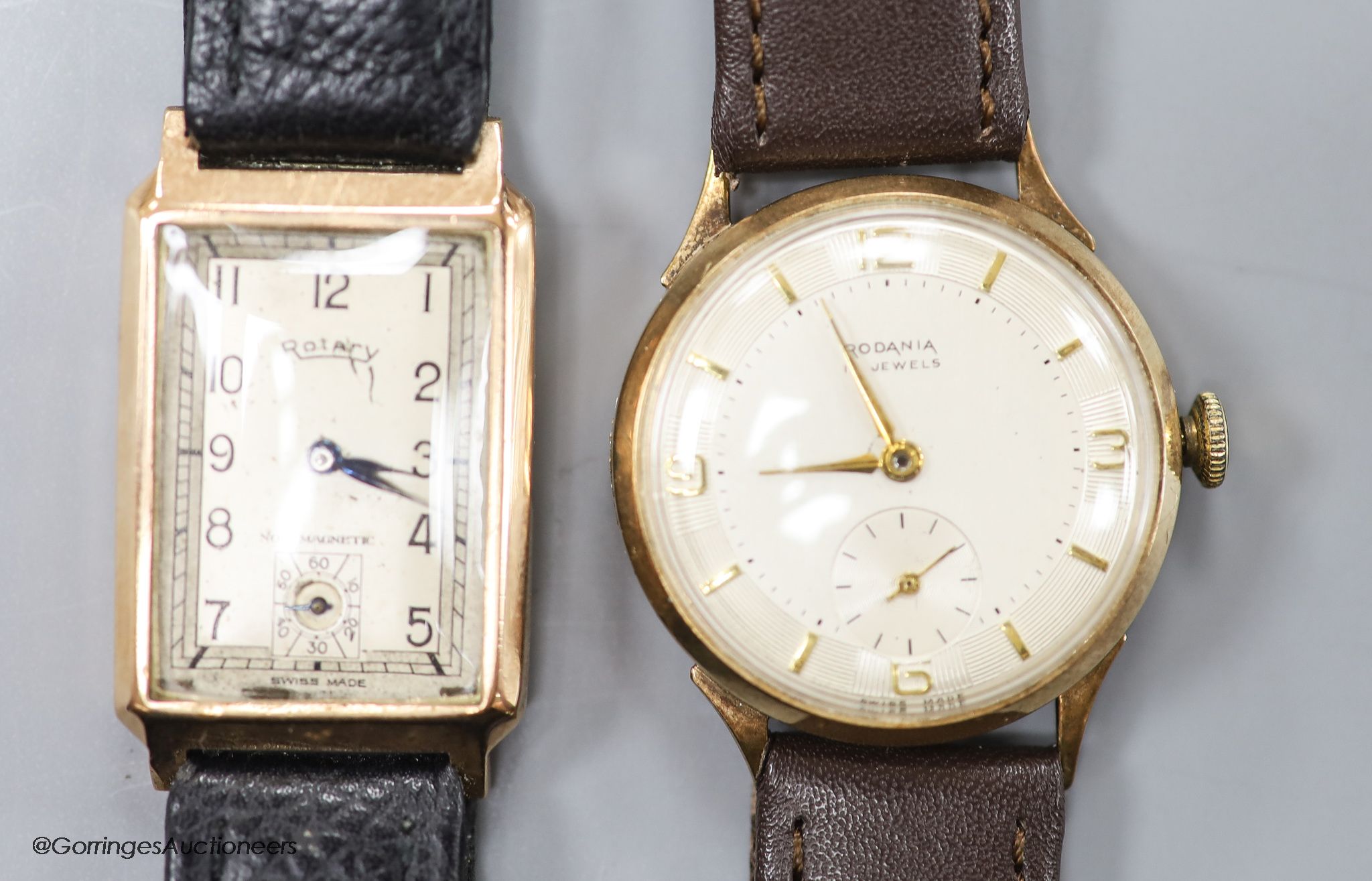 A gentleman's 1930's 9ct gold Rotary rectangular manual wind wrist watch (lacking winding crown) on later leather strap and a later 9ct gold Rodania manual wind wrist watch